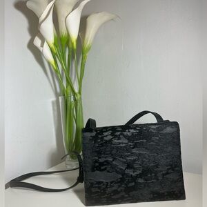 Alexander Wang
Ponyhair-Trimmed Leather Crossbody Bag